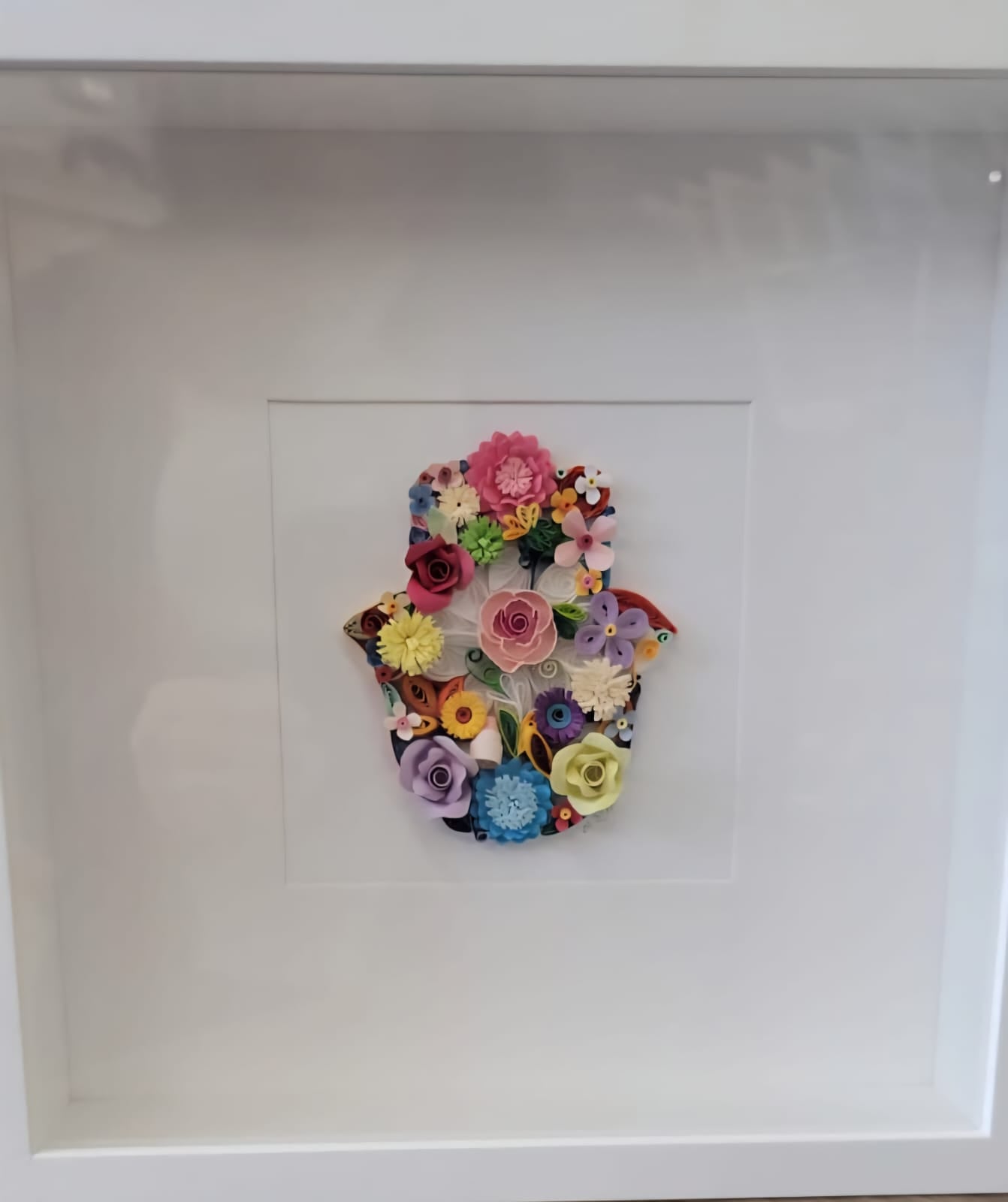 151 - Hamsa mounted in white picture frame